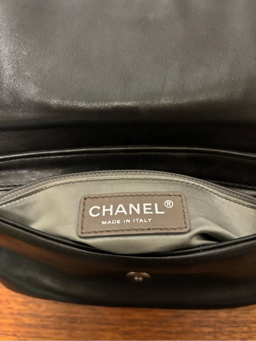 CHANEL Black Quilted Leather Shoulder Bag with Beaded Logo Fringe
